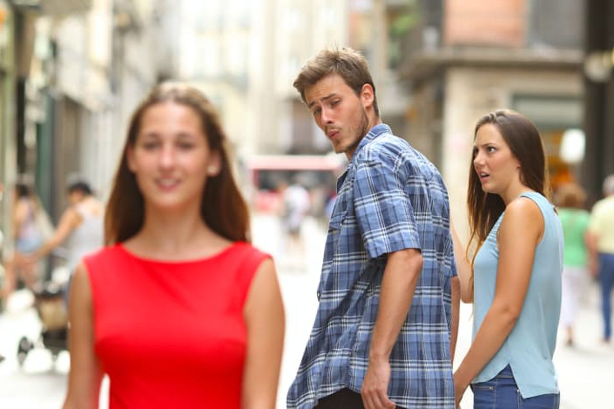 Distracted Boyfriend meme about Johnnie-O
